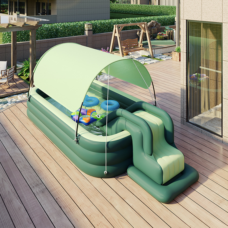 Parc aquatique vert gonflable avec toboggan